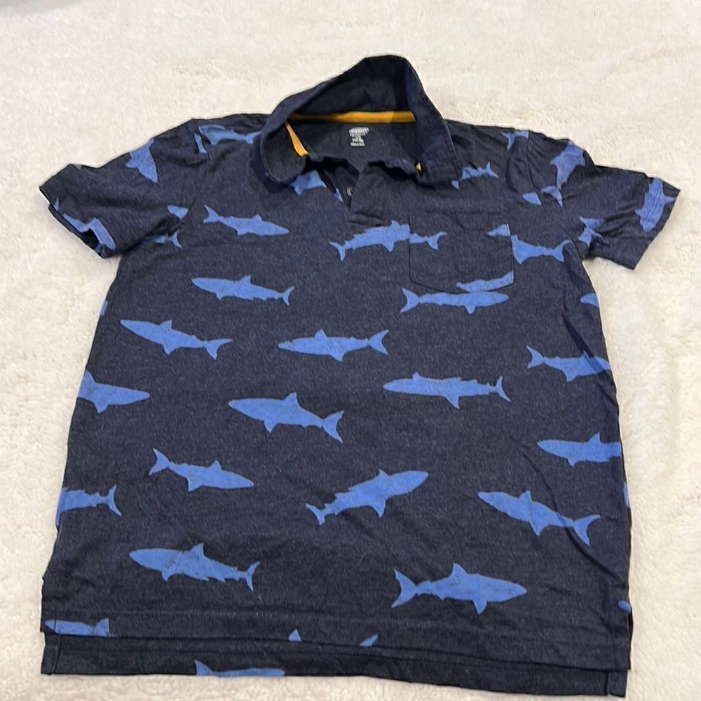 Old navy blue polo shirt with sharks size 10–12